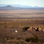 My van and Jr playing hide-n-seek in the vast desert